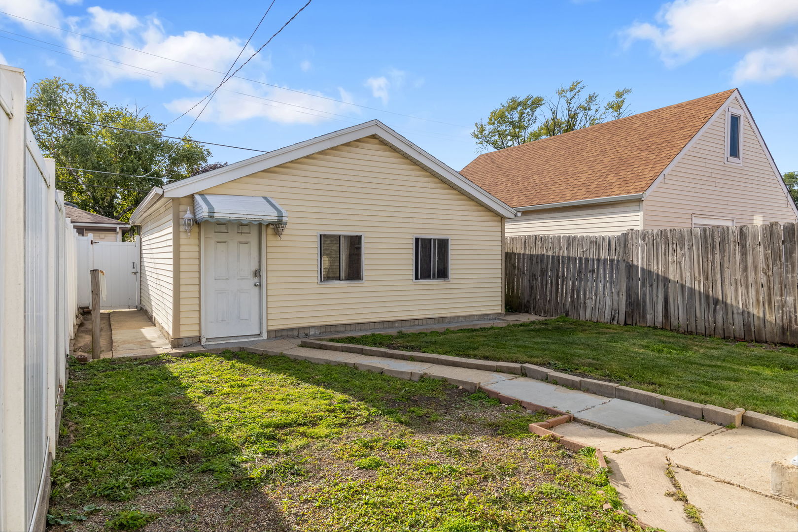 1528 North 39th Avenue Stone Park, IL 60165 - Photo 13 of 16 a view of a backyard with a garden