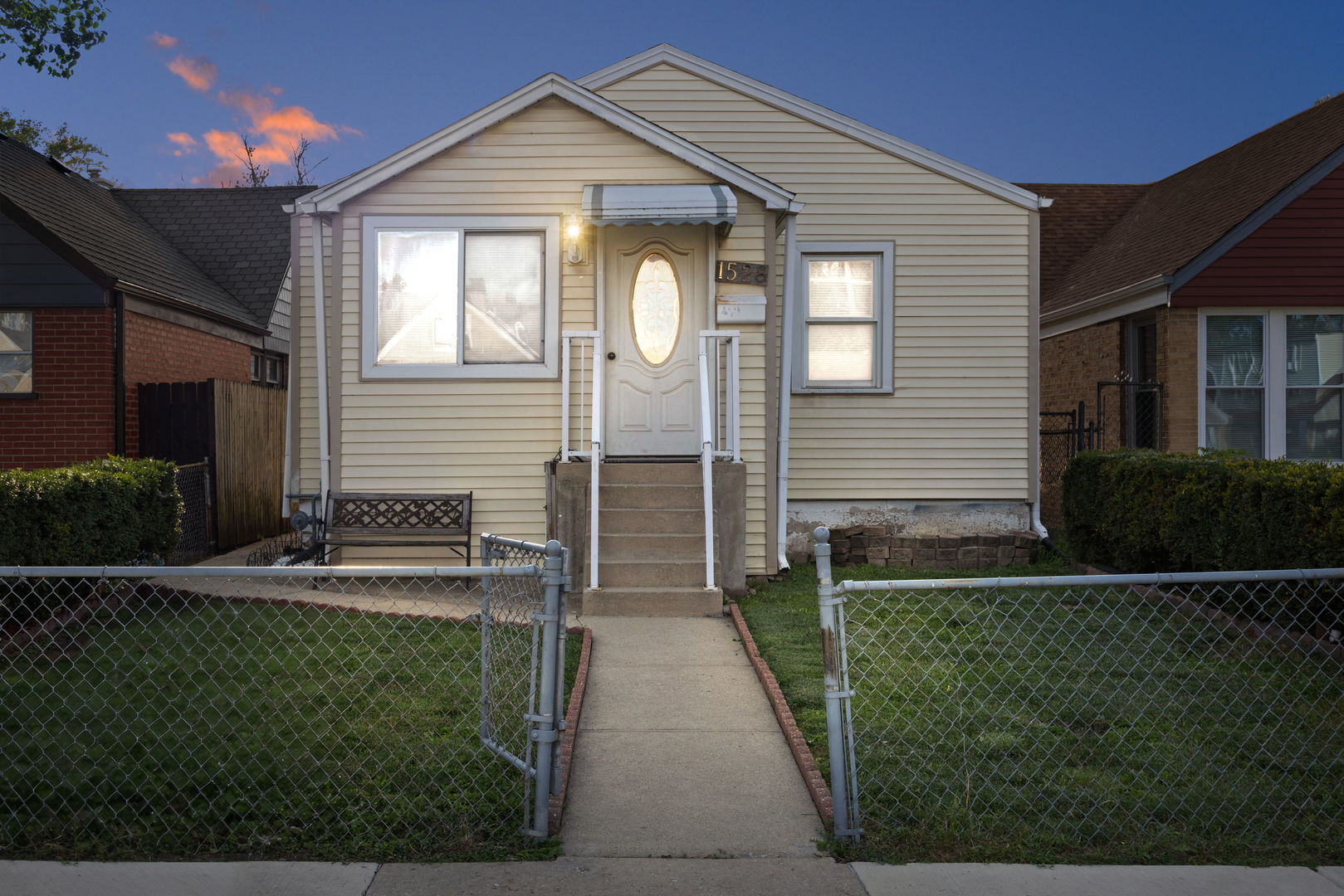 1528 North 39th Avenue Stone Park, IL 60165 - Photo 16 of 16 a front view of a house with garden