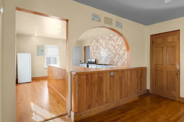 a kitchen with stainless steel appliances granite countertop a stove and a sink