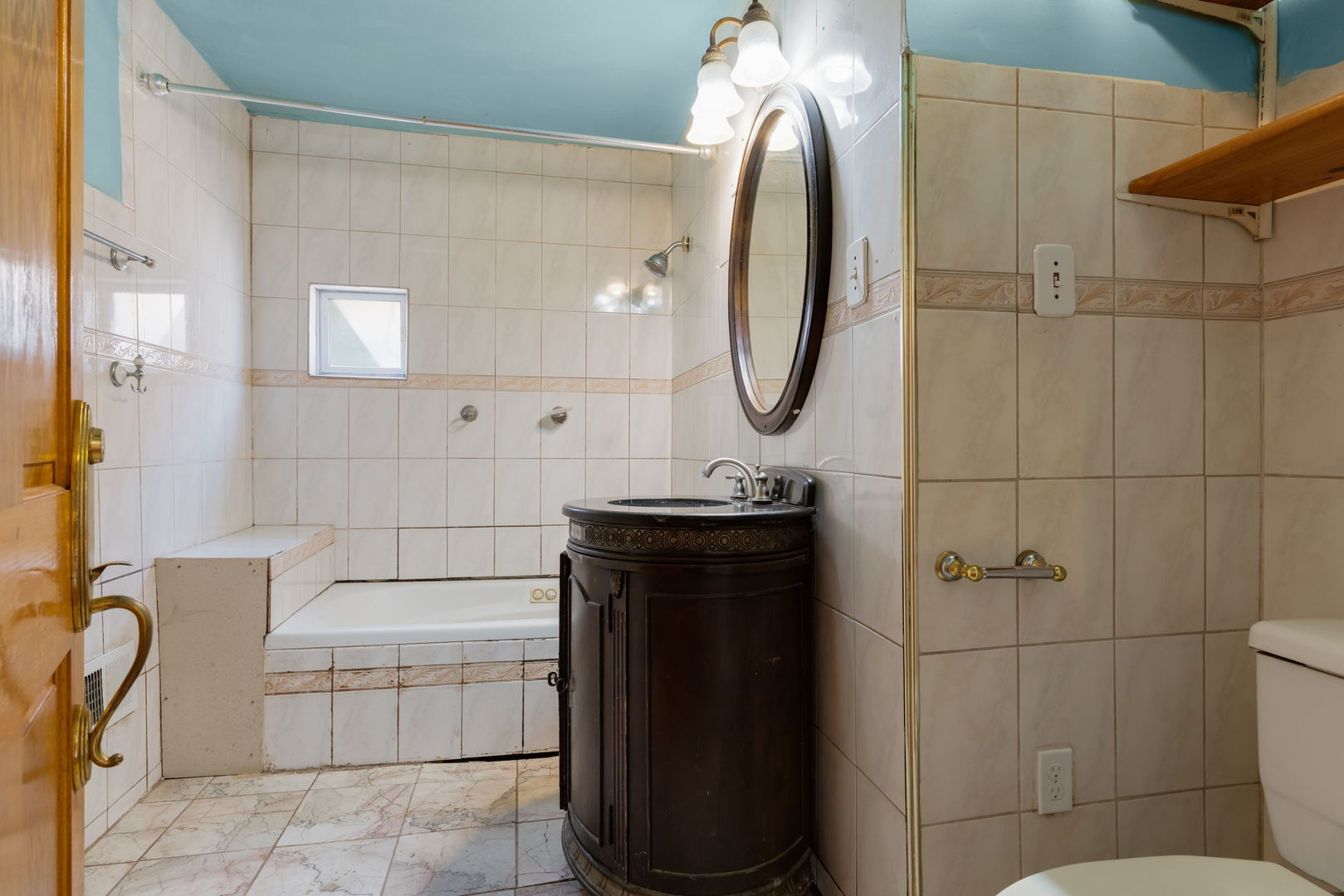 1528 North 39th Avenue Stone Park, IL 60165 - Photo 8 of 16 a bathroom with a sink and a mirror