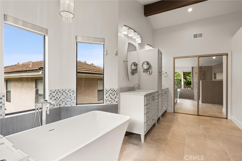 24692 Kings Road Laguna Niguel, CA 92677 - Photo 20 of 39 a large white kitchen with a large window