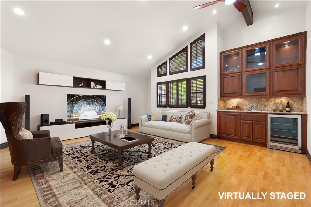 24692 Kings Road Laguna Niguel, CA 92677 - Photo 23 of 39 a living room with furniture and a fireplace