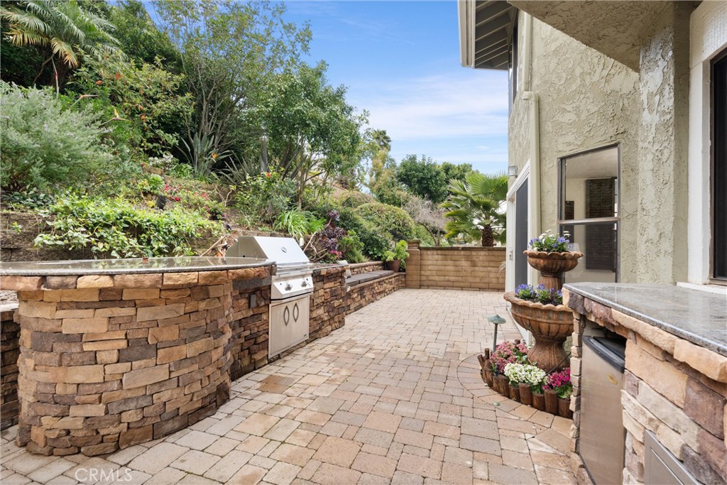 24692 Kings Road Laguna Niguel, CA 92677 - Photo 37 of 39 a view of a pathway along with potted plants