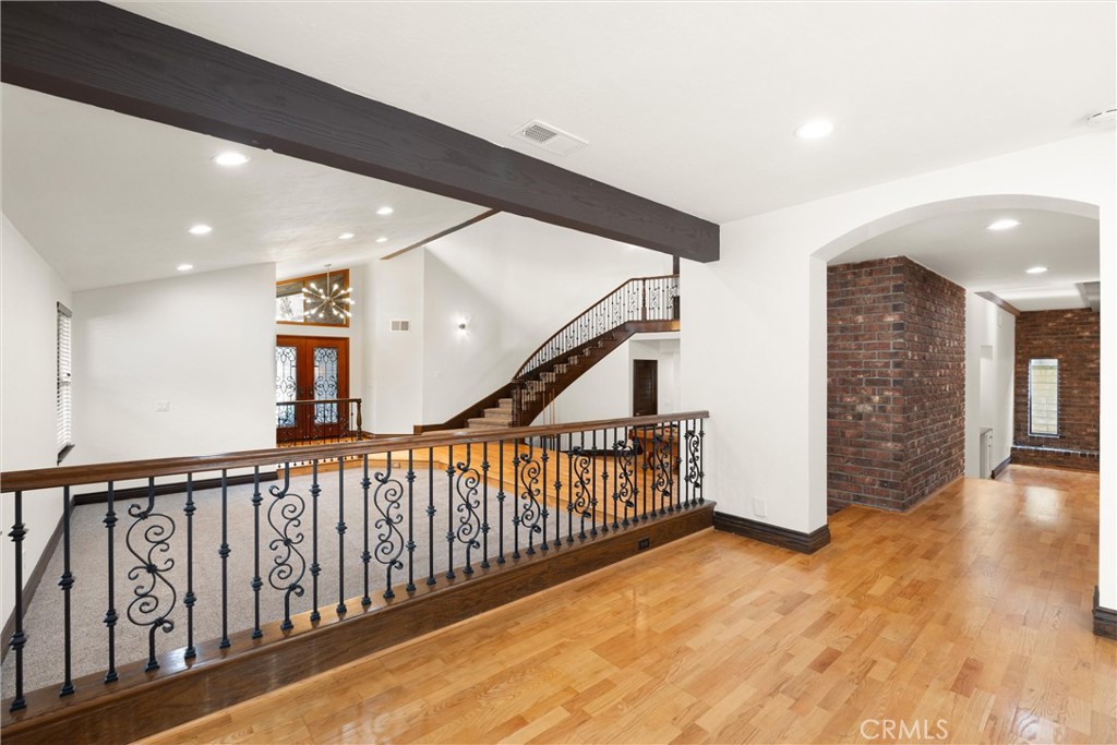 24692 Kings Road Laguna Niguel, CA 92677 - Photo 5 of 39 a view of entryway with stairs and wooden floor