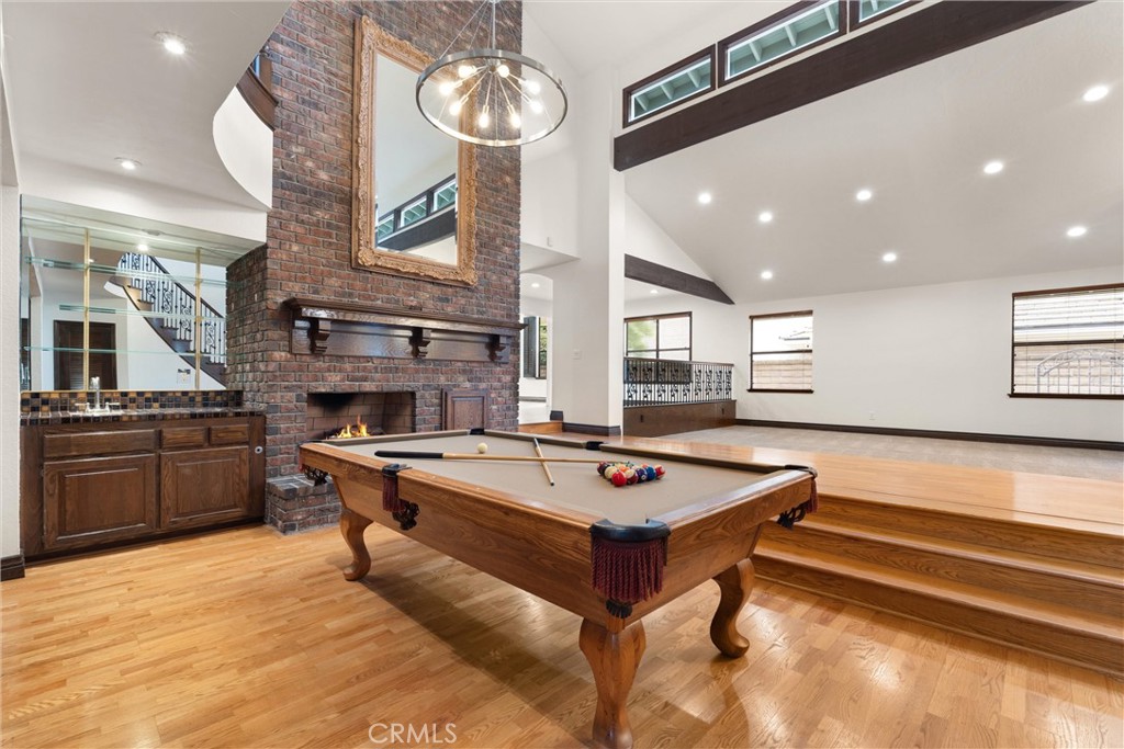 24692 Kings Road Laguna Niguel, CA 92677 - Photo 6 of 39 a living room with stainless steel appliances kitchen island granite countertop a stove and a sink