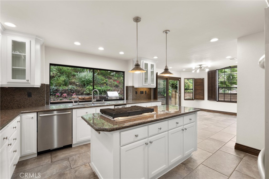 24692 Kings Road Laguna Niguel, CA 92677 - Photo 7 of 39 a kitchen with counter top space appliances and cabinets