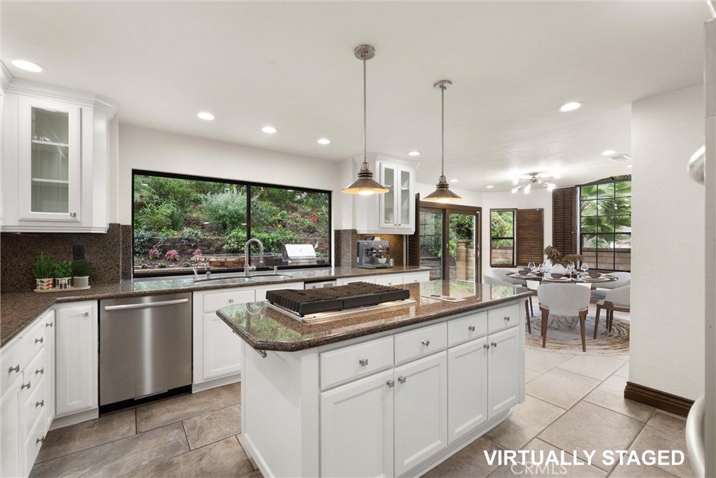 24692 Kings Road Laguna Niguel, CA 92677 - Photo 8 of 39 a kitchen with counter top space appliances and windows
