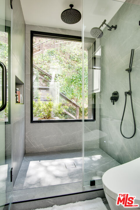 9624 Yoakum Drive Beverly Hills, CA 90210 - Photo 18 of 27 a bathroom with a shower