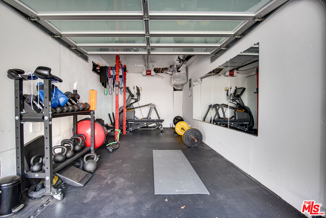 9624 Yoakum Drive Beverly Hills, CA 90210 - Photo 26 of 27 a view of a room with gym equipment