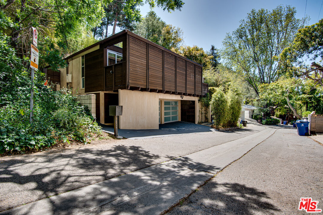 9624 Yoakum Drive Beverly Hills, CA 90210 - Photo 27 of 27 a view of a house with a yard