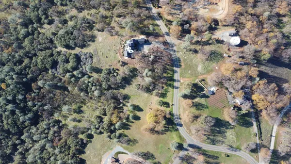 a view of outdoor space with deck and tree