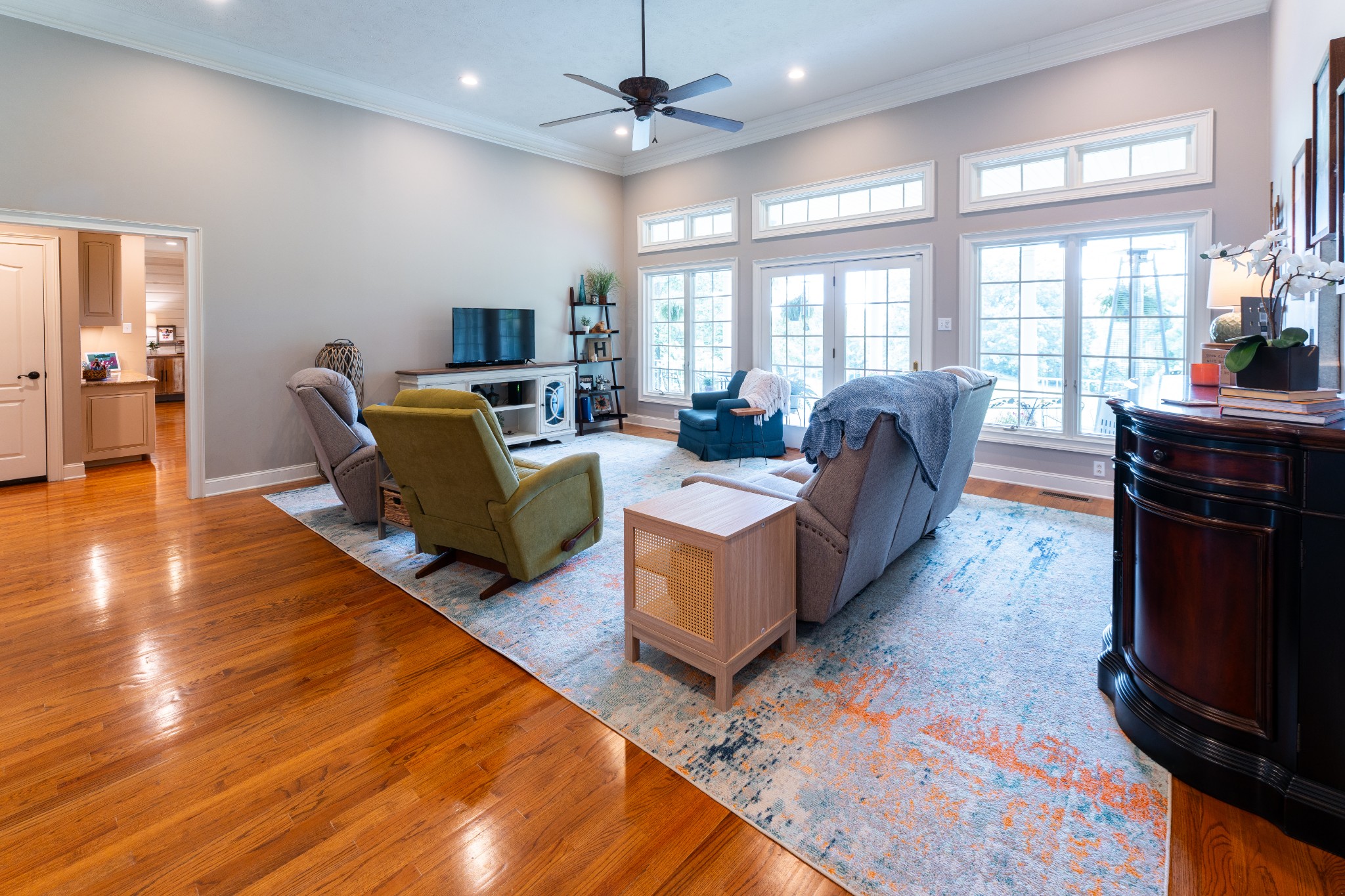 1015 Kelly Road Dyersburg, TN 38024 - Photo 15 of 41 a living room with furniture a flat screen tv and a fireplace