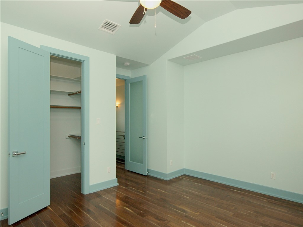 306 Franklin Boulevard, Unit A Austin, TX 78751 - Photo 17 of 19 wooden floor in an empty room
