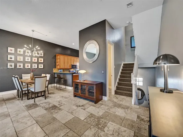 a view of a dining room with furniture