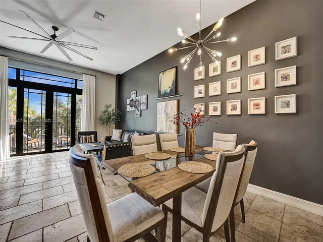 a kitchen with stainless steel appliances a stove sink and cabinets