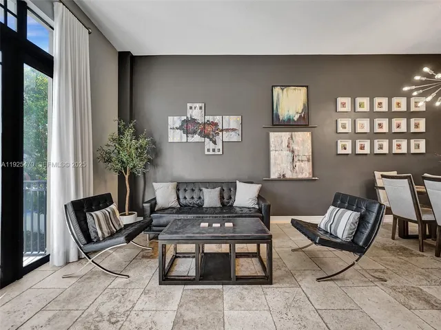 a bedroom with a couch and a stove top oven