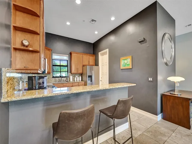 a bedroom with a bed and dresser