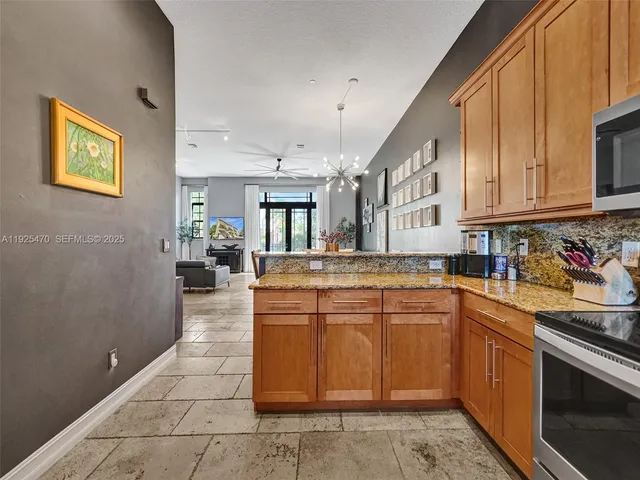 a bathroom with a bathtub shower sink mirror and toilet