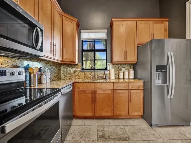 a bath tub sitting next to a shower