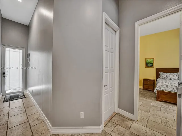 a bathroom with a sink toilet a mirror and shower