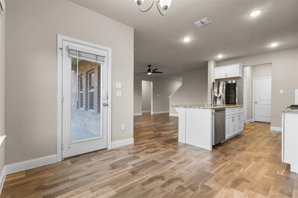 2900 Country Church Road McKinney, TX 75071 - Photo 40 of 40 a view of kitchen with refrigerator microwave and stove