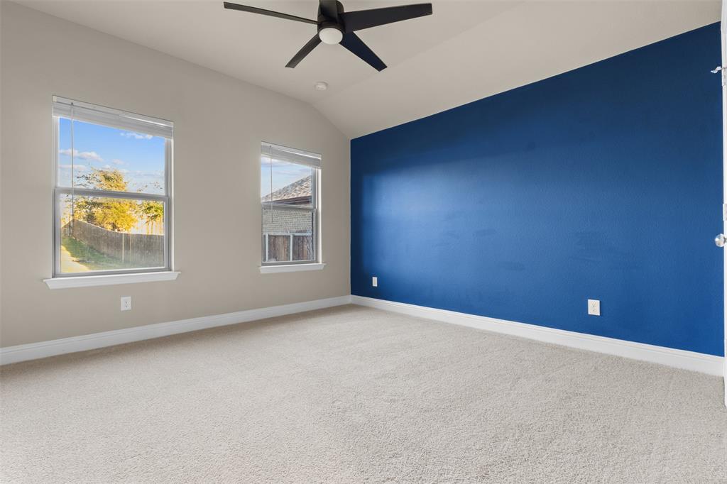 2900 Country Church Road McKinney, TX 75071 - Photo 14 of 40 an empty room with windows and fan