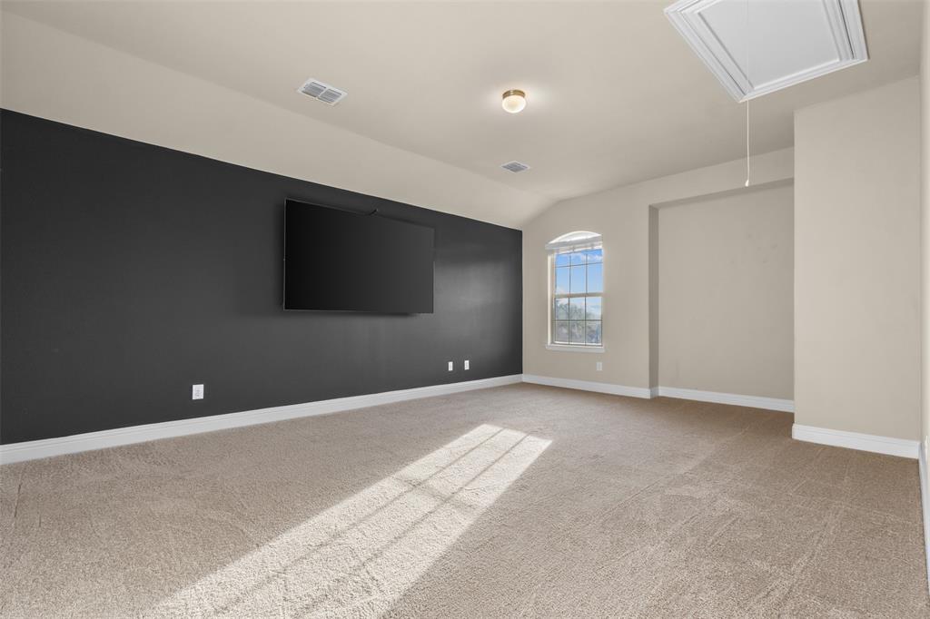 2900 Country Church Road McKinney, TX 75071 - Photo 22 of 40 a view of an empty room with windows and closet
