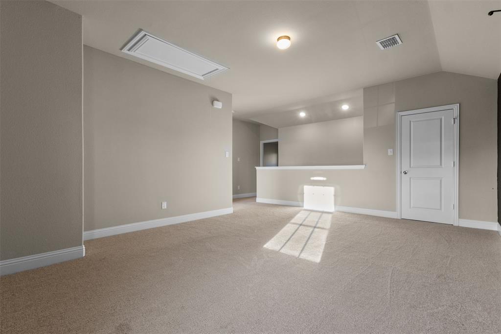 2900 Country Church Road McKinney, TX 75071 - Photo 24 of 40 a view of a kitchen with a sink and white cabinets