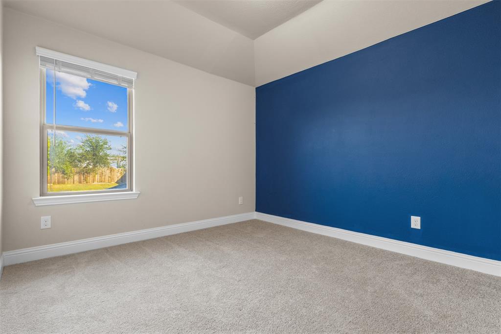 2900 Country Church Road McKinney, TX 75071 - Photo 28 of 40 an empty room with windows