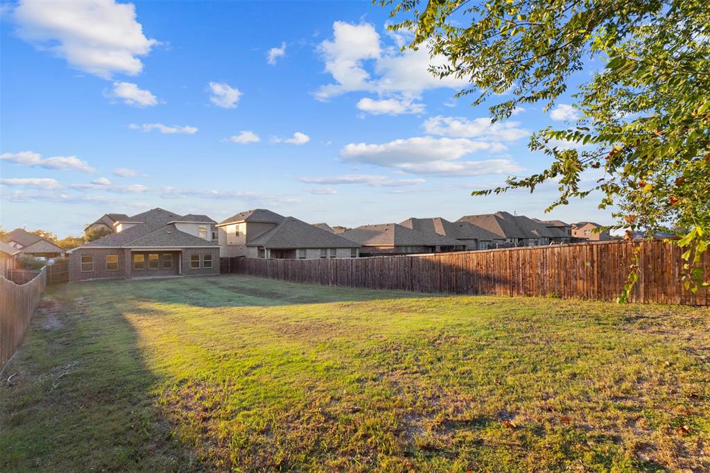 2900 Country Church Road McKinney, TX 75071 - Photo 33 of 40 a view of a lake with a house in the background