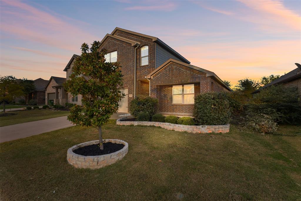 2900 Country Church Road McKinney, TX 75071 - Photo 4 of 40 a front view of a house with garden