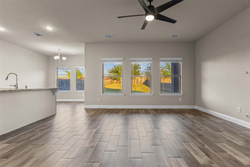 2900 Country Church Road McKinney, TX 75071 - Photo 6 of 40 wooden floor in an empty room with a window