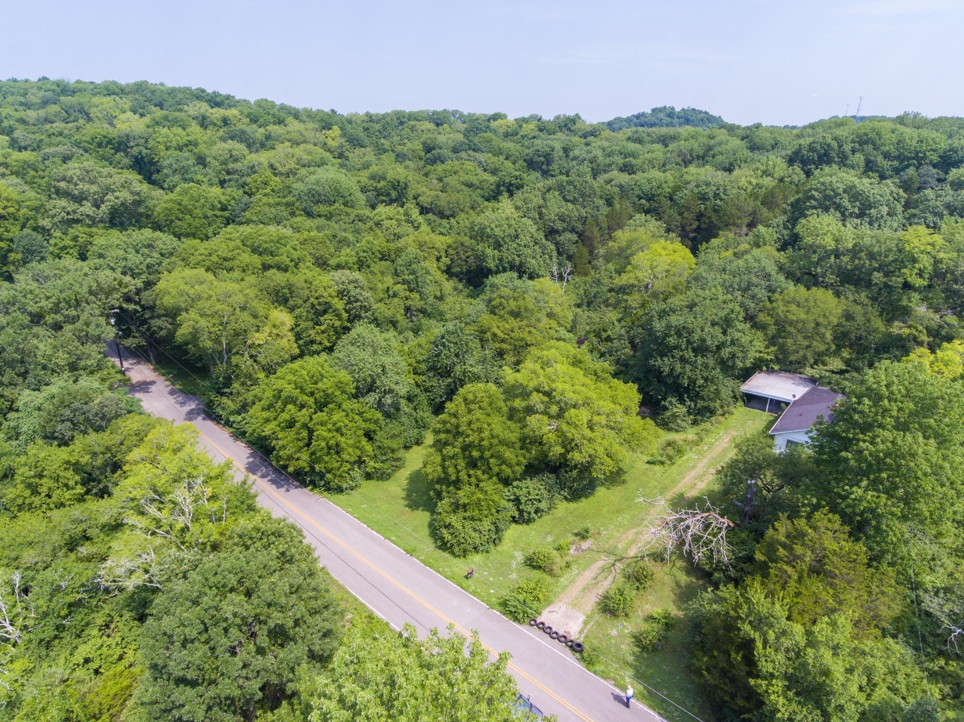620 Creative Way Madison, TN 37115 - Photo 3 of 6 a view of a garden with a house