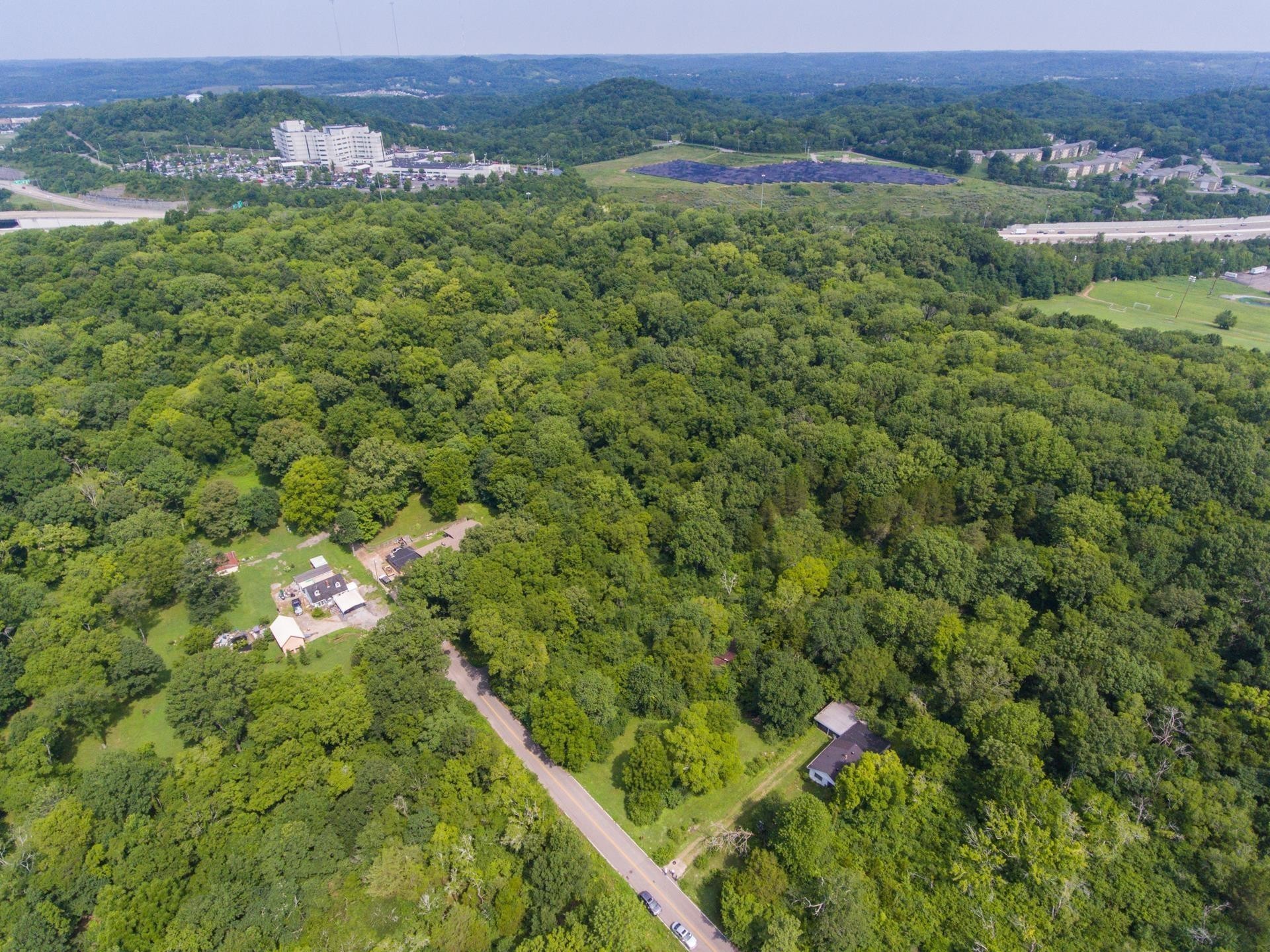 620 Creative Way Madison, TN 37115 - Photo 4 of 6 an aerial view of residential houses with outdoor space and trees