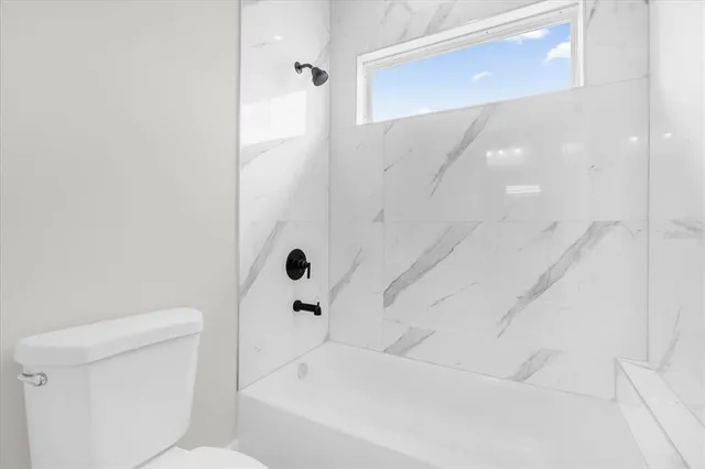 a bathroom with a bathtub
