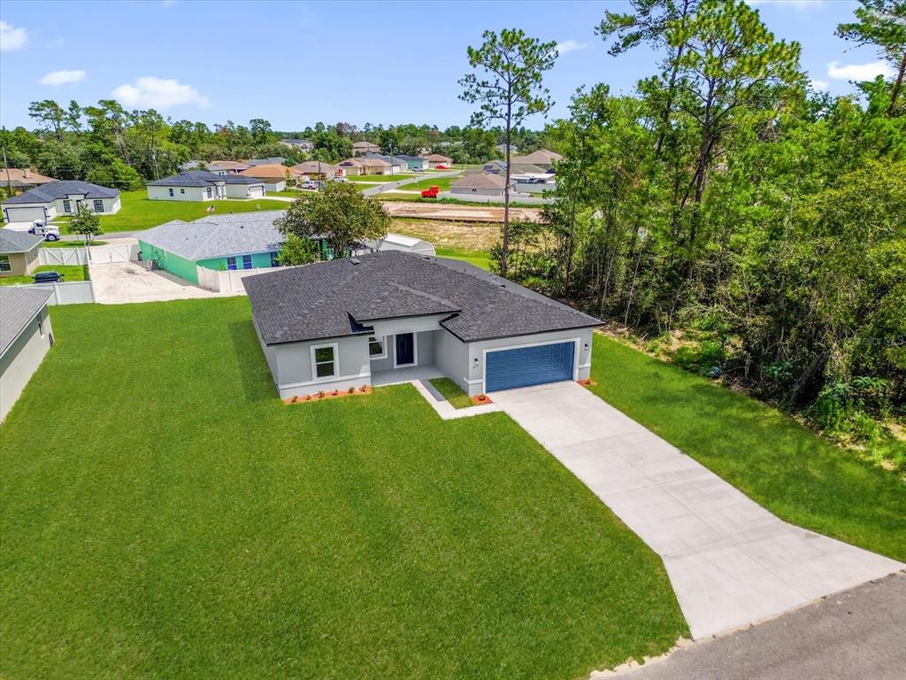 4535 Southwest 172nd Street Road Ocala, FL 34473 - Photo 32 of 35 a view of a house with garden