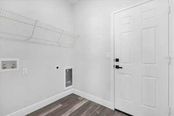 a view of small space with wooden floor
