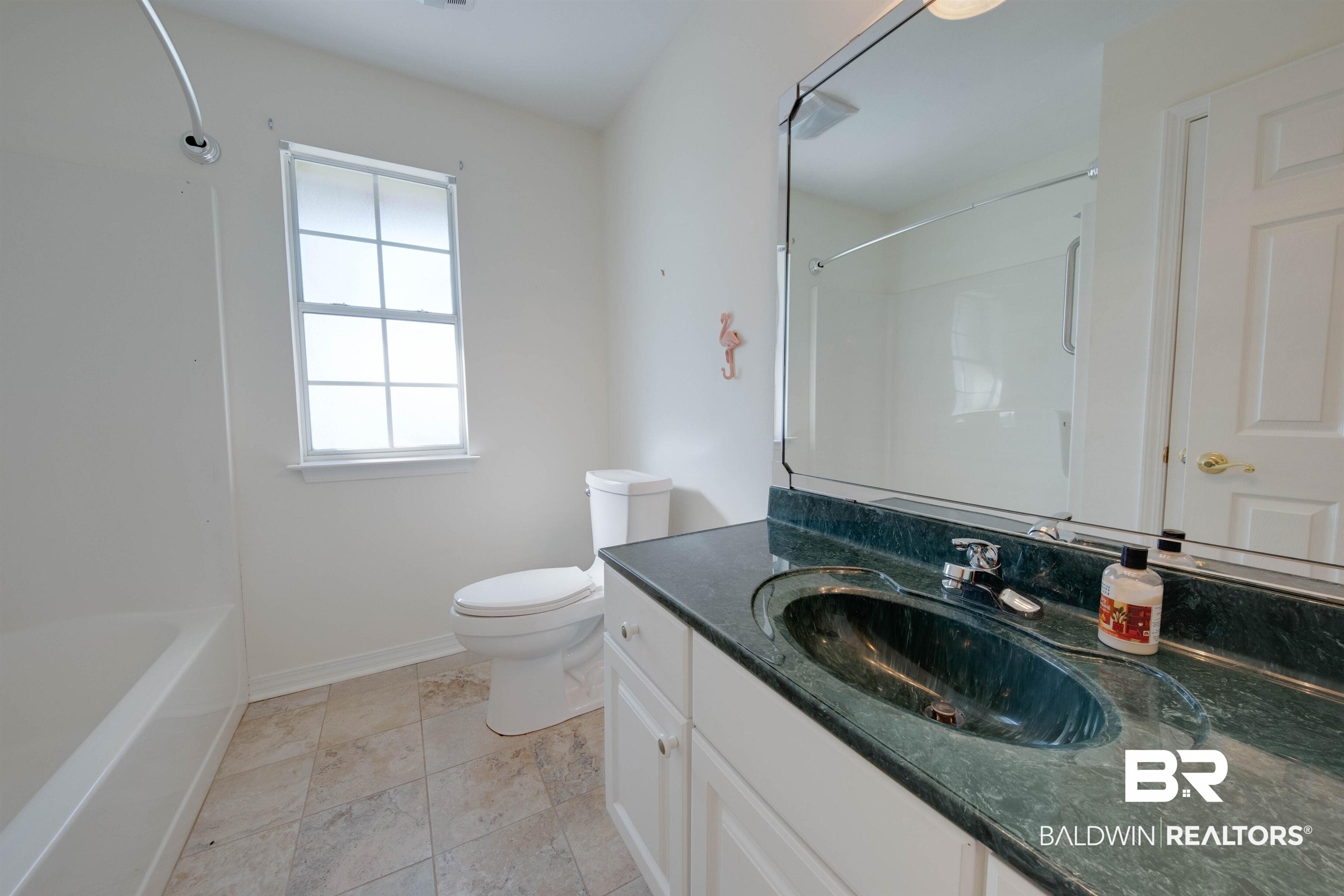 9462 Lakeview Drive Foley, AL 36535 - Photo 34 of 50 Full bathroom featuring vanity, toilet, and bathing tub / shower combination