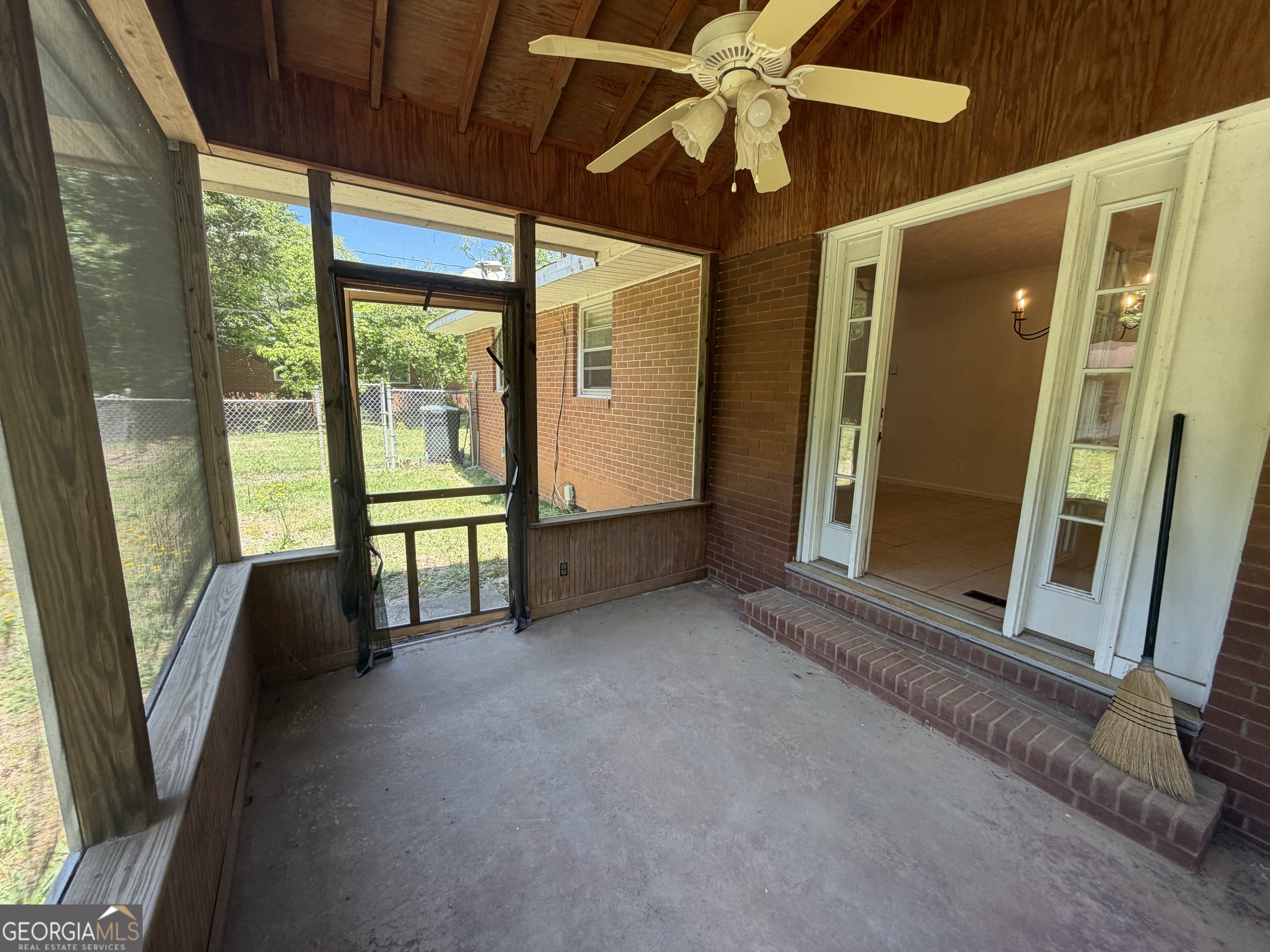 1005 North 1st Street Fort Valley, GA 31030 - Photo 25 of 28 wooden floor in an empty room with a window