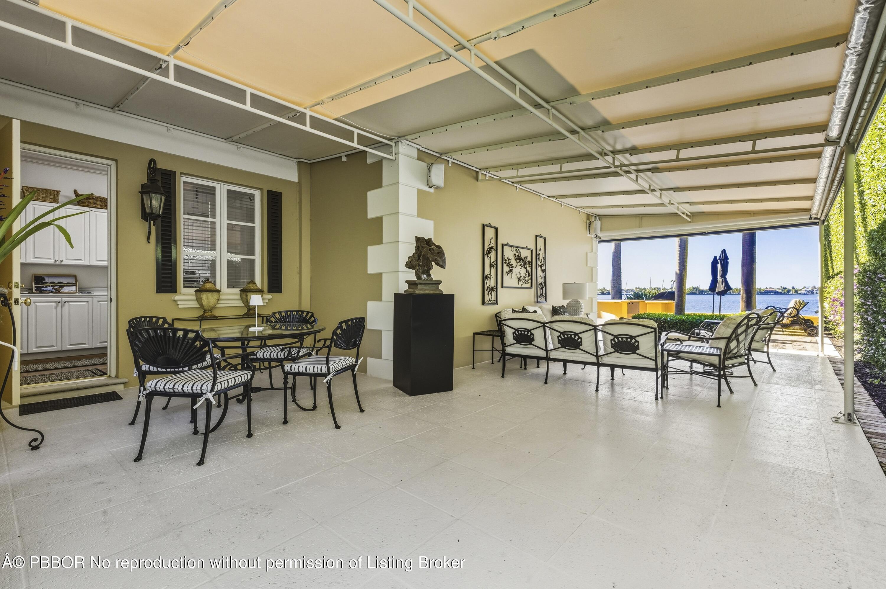 127 Ocean View Road Palm Beach, FL 33480 - Photo 25 of 96 Awning covered patio