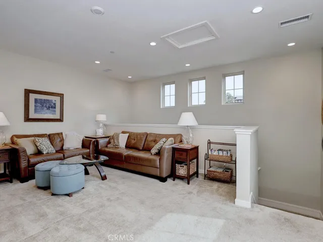 a view of a tables and chairs in patio of the house