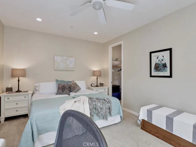 a view of a patio with table and chairs and potted plants