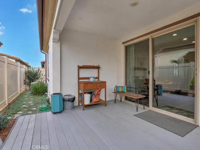 a view of swimming pool with outdoor seating and city view