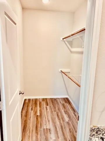 a view of a livingroom with wooden floor