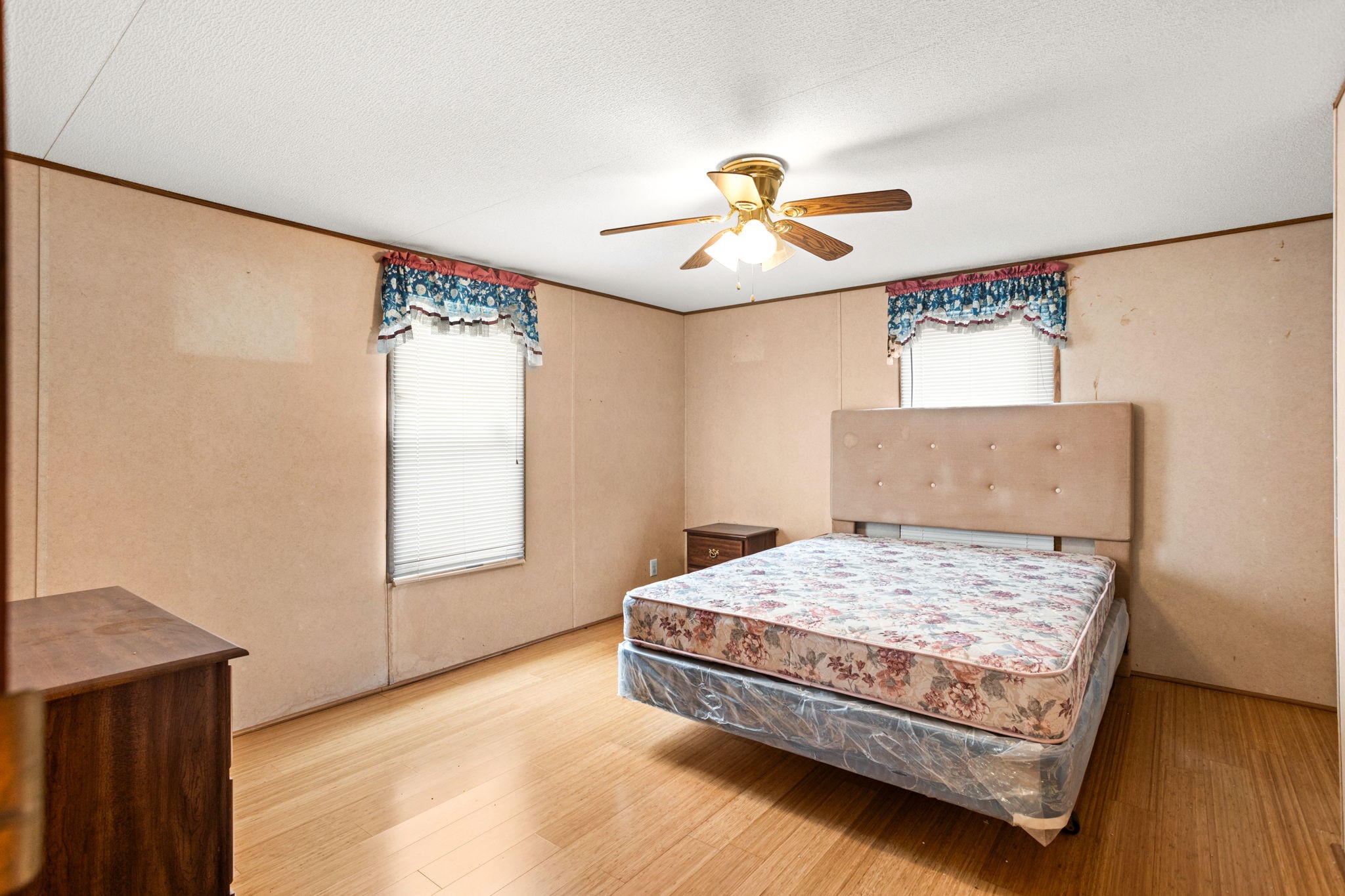 7075 Whartons Dock Road Bandera, TX 78003 - Photo 11 of 19 a bedroom with a bed and window