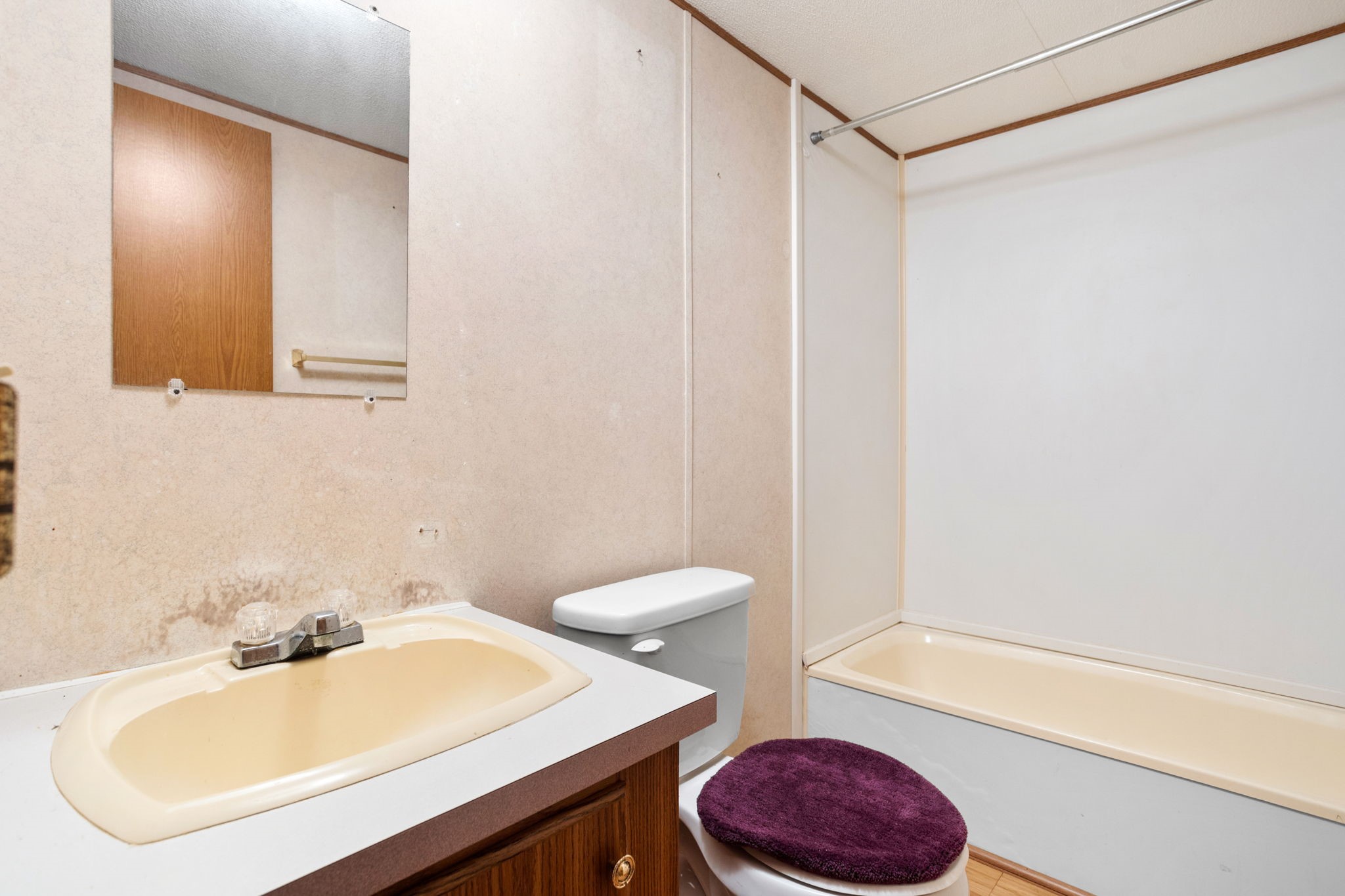 7075 Whartons Dock Road Bandera, TX 78003 - Photo 14 of 19 a bathroom with a sink a toilet and tub