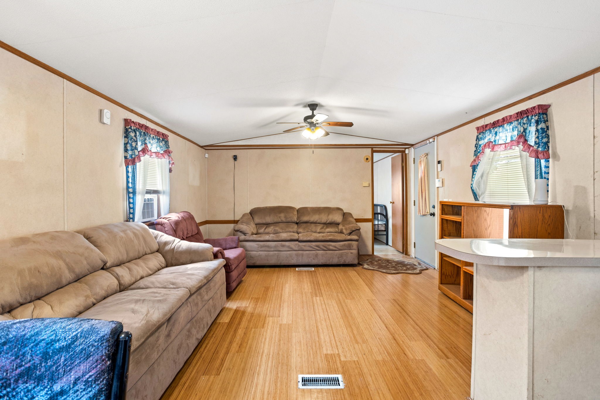 7075 Whartons Dock Road Bandera, TX 78003 - Photo 5 of 19 a living room with furniture and a flat screen tv