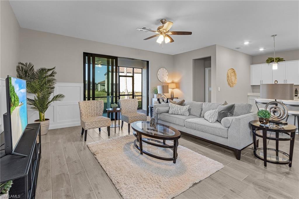 20716 Napa Loop Estero, FL 33928 - Photo 6 of 50 a living room with furniture potted plant and a window