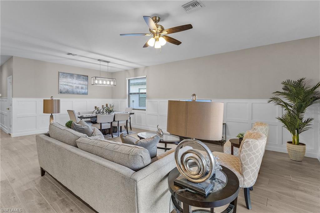 20716 Napa Loop Estero, FL 33928 - Photo 7 of 50 a living room with furniture and a large window