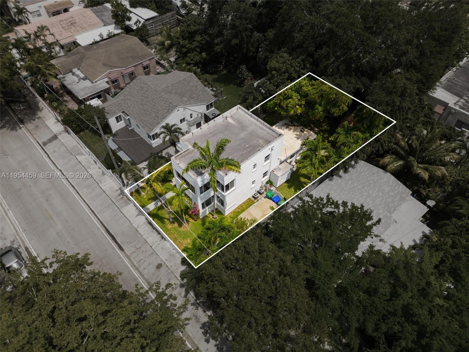 555 Northeast 70th Street Miami, FL 33138 - Photo 13 of 14 an aerial view of a house